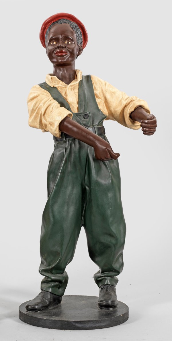 Dekorative Figur eines dunkelhäutigen Knaben