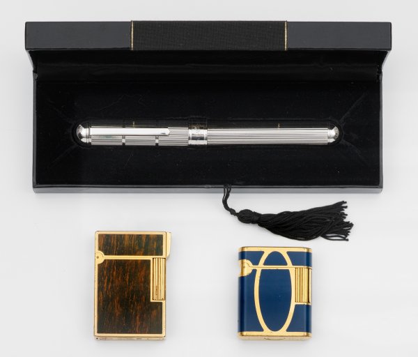 Drei Luxus-Accessoires von YVES Saint Laurent und Dupont