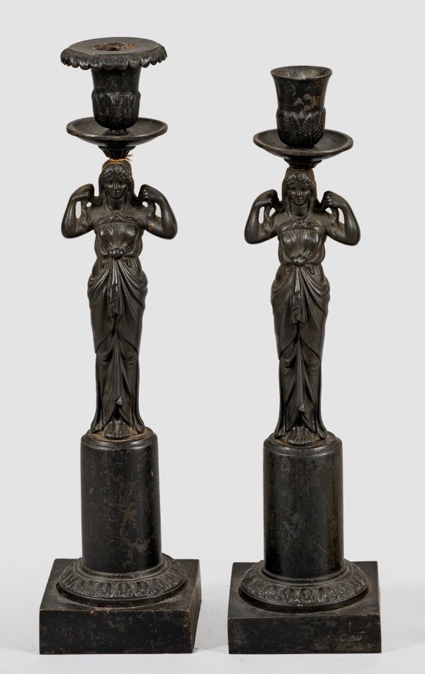 Paar figürliche Eisenleuchter
